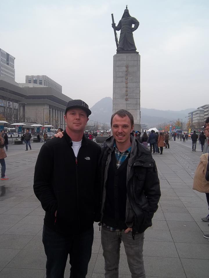 Tim and brother at famous statue in Seould
